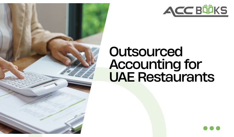 Accountant reviewing a ledger and restaurant receipts on a wooden desk in a UAE cafe, highlighting outsourced accounting for hospitality finance management.