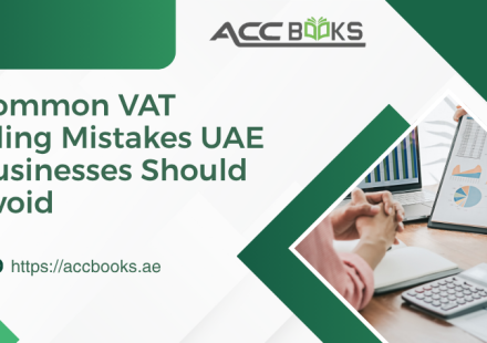 UAE finance team reviewing VAT returns on a tablet with warning signs and error icons, illustrating common VAT filing mistakes businesses must avoid.