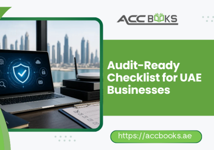 UAE business executive reviewing an Audit-Ready Checklist on a digital tablet with organized financial documents and folders in a modern office