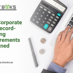 Organized tax record files and digital documents illustrating UAE Corporate Tax record-keeping requirements, including retention periods and compliance documentation