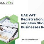 Business owner completing UAE VAT Registration online with FTA portal, registration form, and VAT compliance documents on a desk